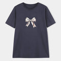 Women's short sleeve tee with metallic bow graphic
